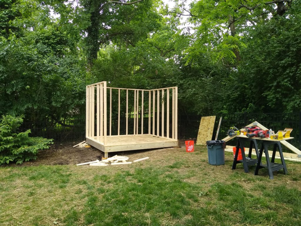 Three sides of wall framing are up.