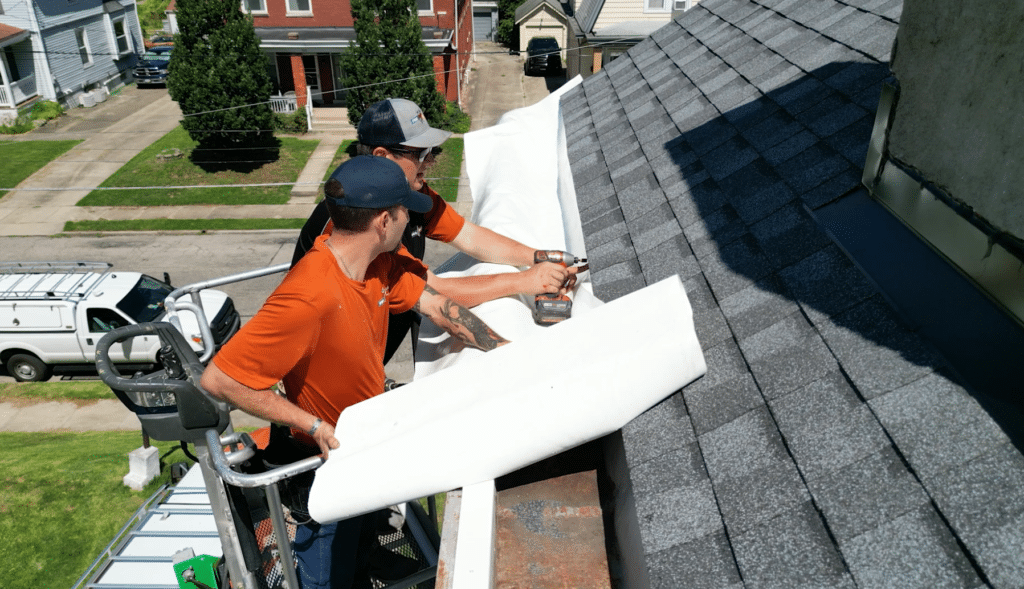 ProMaster craftsmen installing the thermoplastic PVC liner.