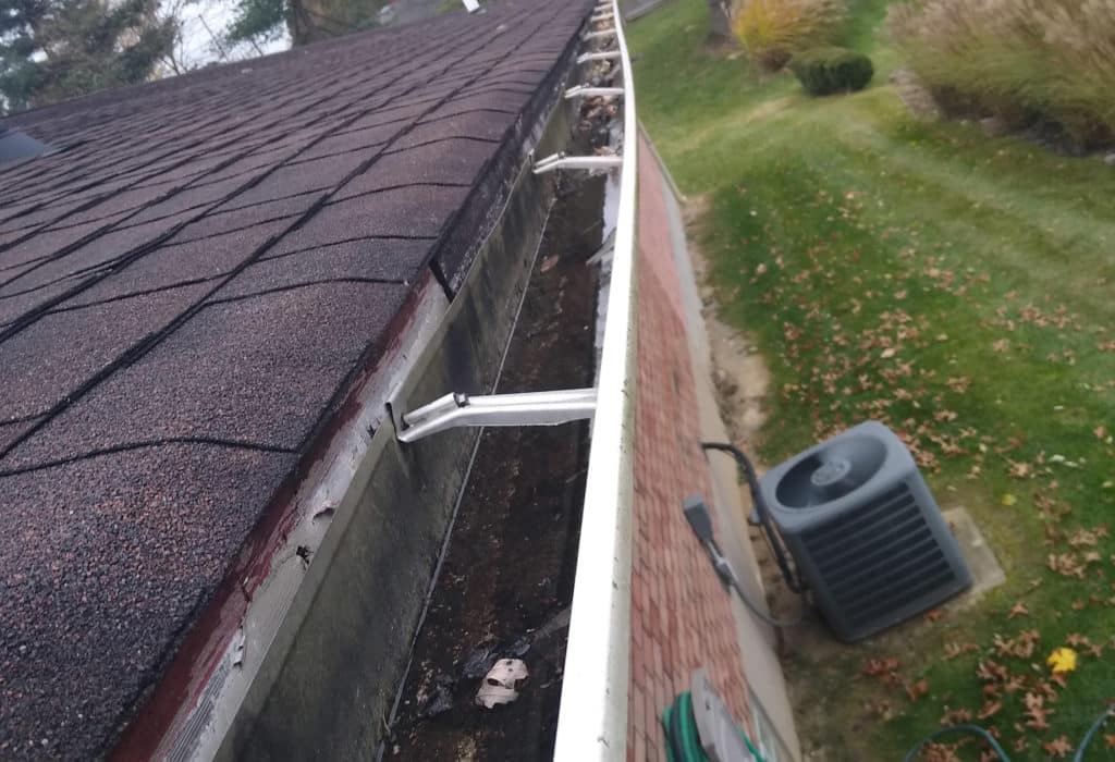 Regular gutters that are attached to the house, rather than built into the roofline like box gutters.