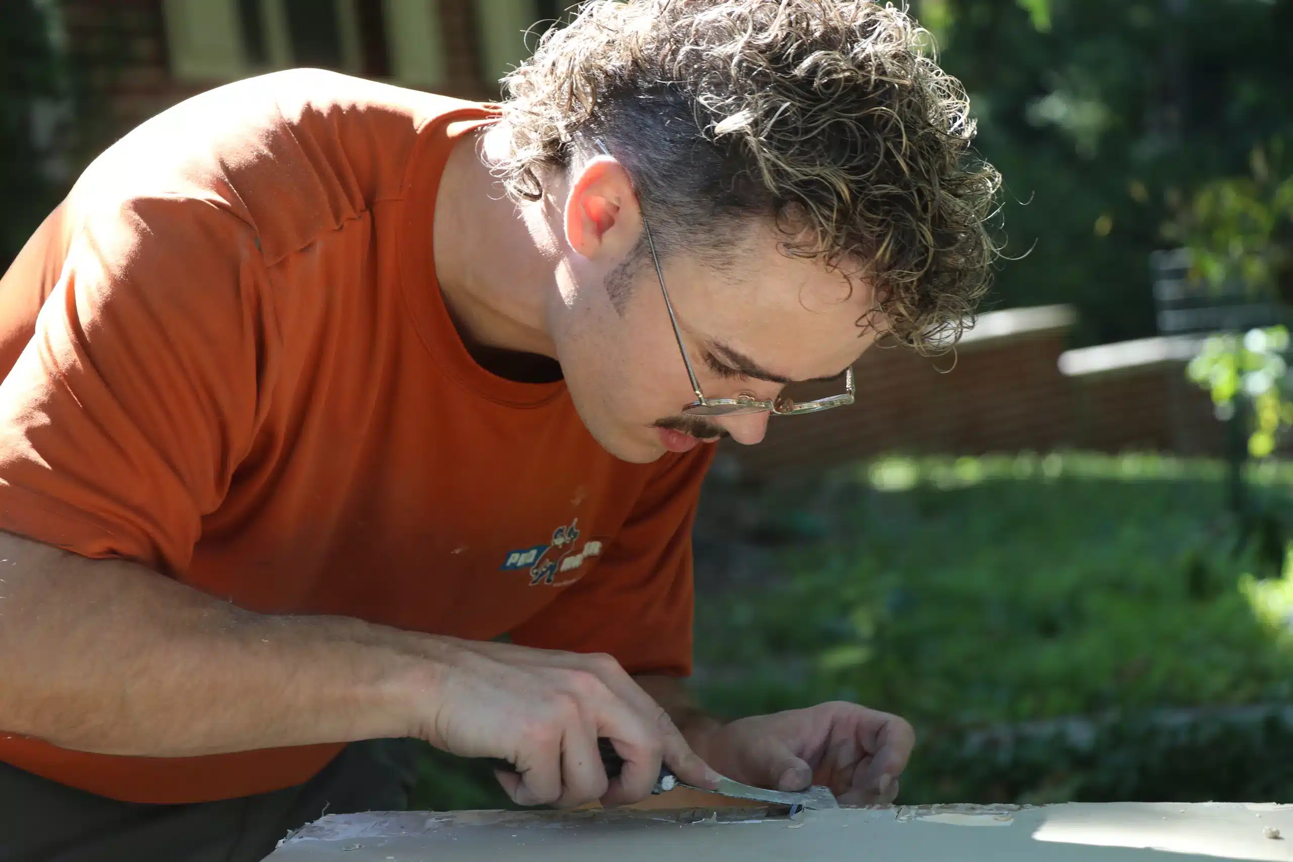 ProMaster craftsman performs an Oakley handyman service, door repair.
