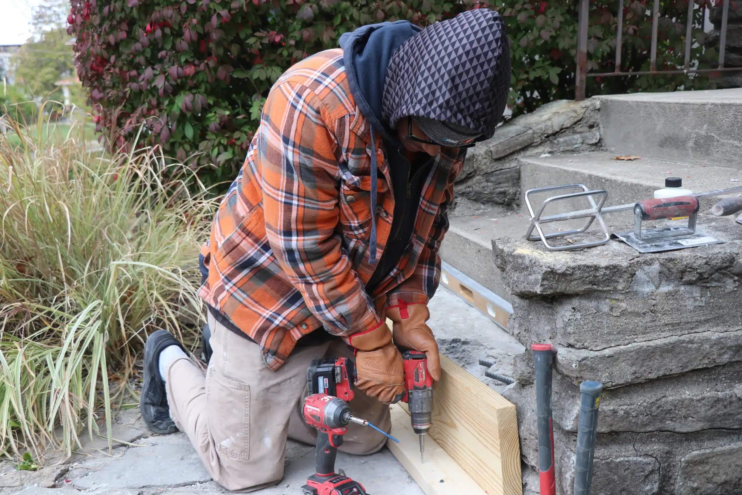 ProMaster Craftsman peforms a Cincinnati handyman service, concrete repair.
