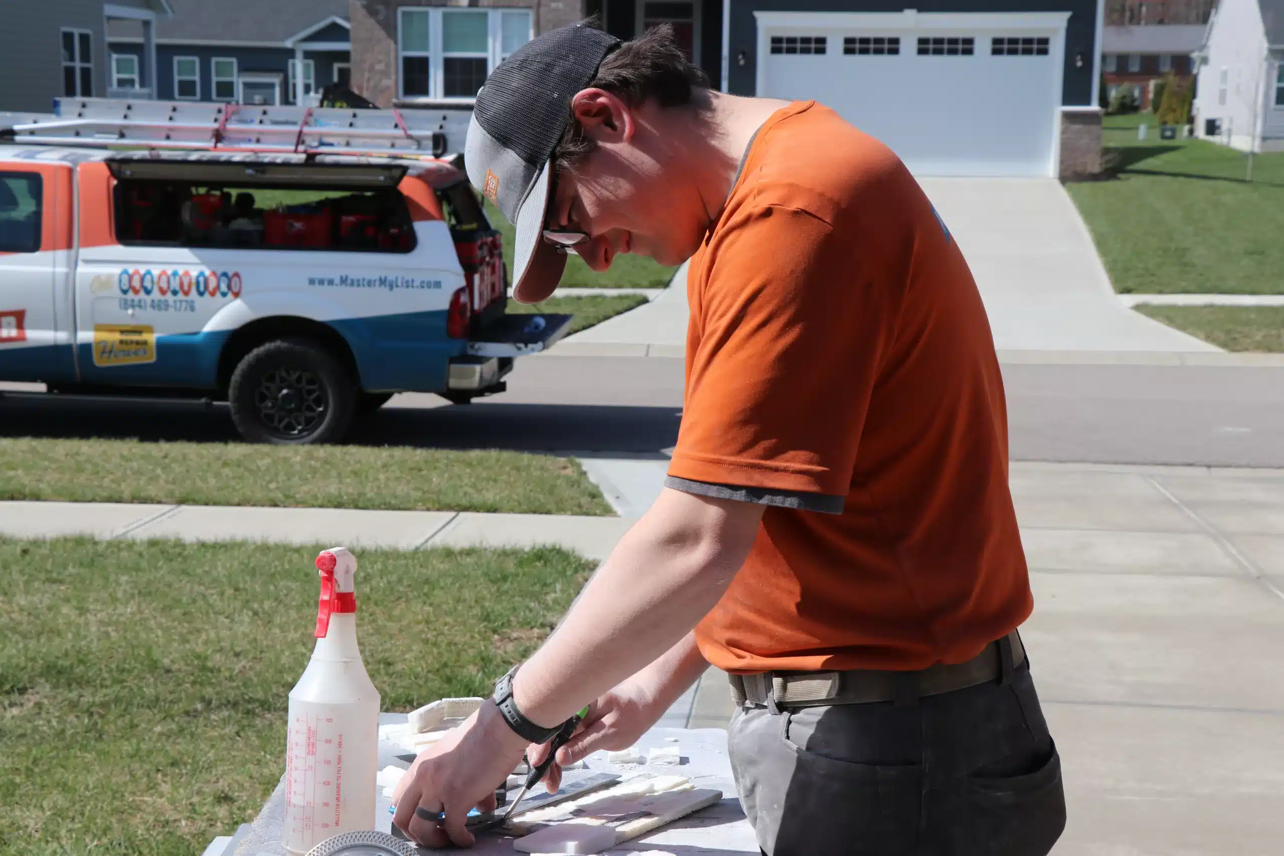 ProMaster craftsman performing tile installation and repair in Cincinnati, OH.