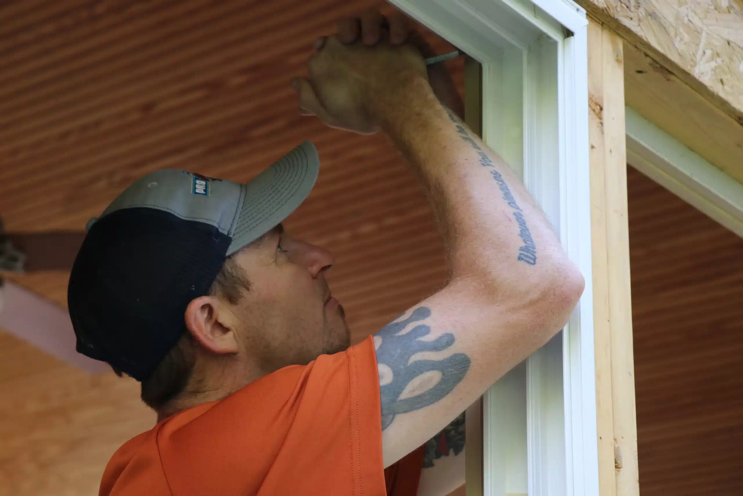 ProMaster craftsman performing Cincinnati door repair and window repair.